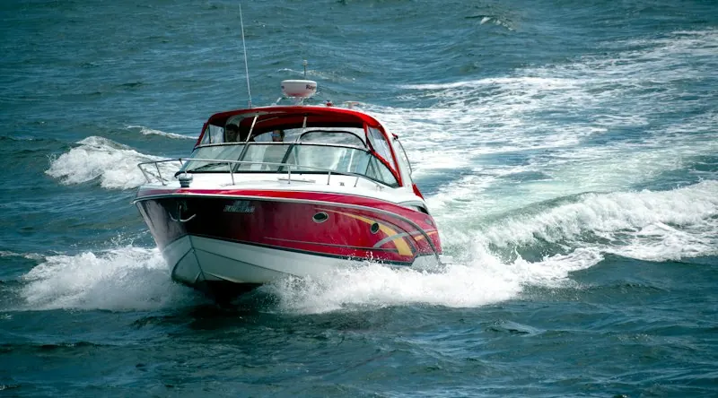 Red speedboat on the water