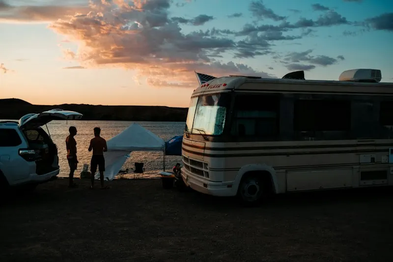 RV parked at sunset