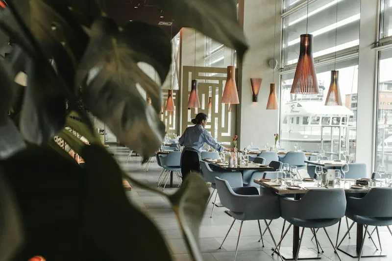 Elegant club restaurant set for dinner