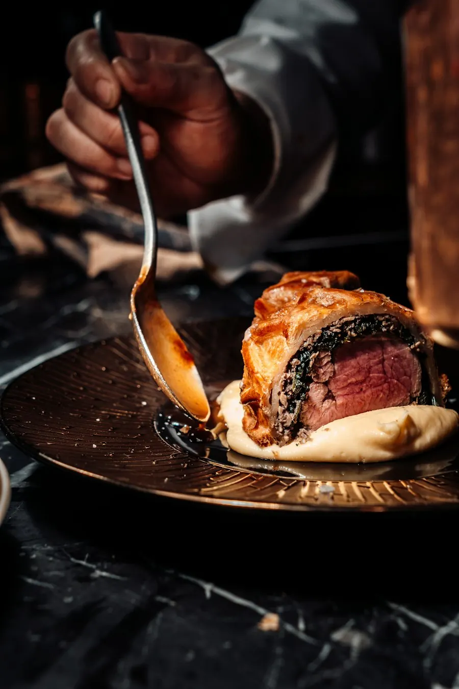 Plated steak dinner served at an event