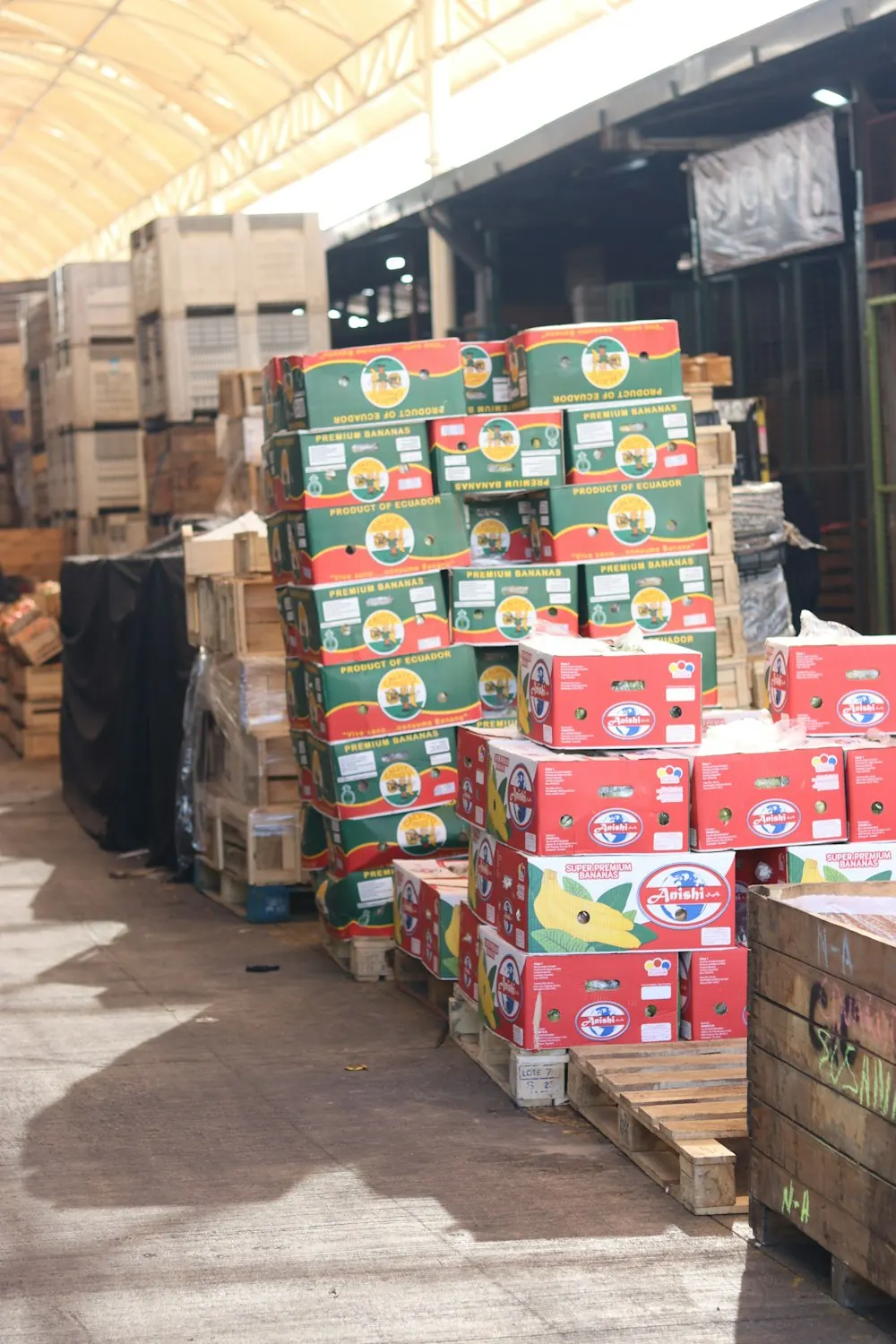Boxes of fruit stacked on pallets