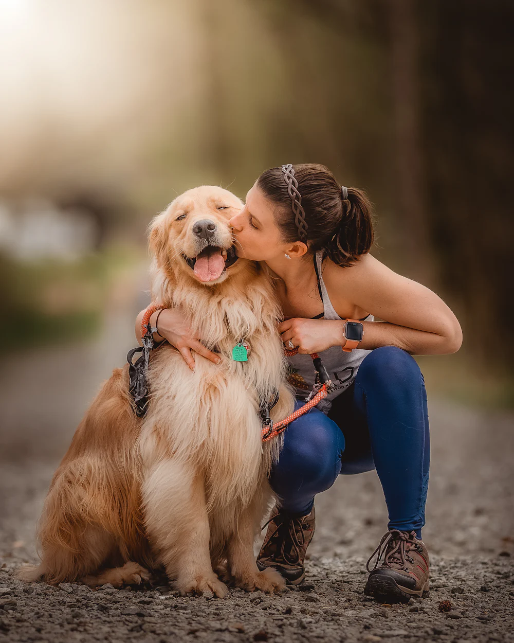 Owner hugging their dog