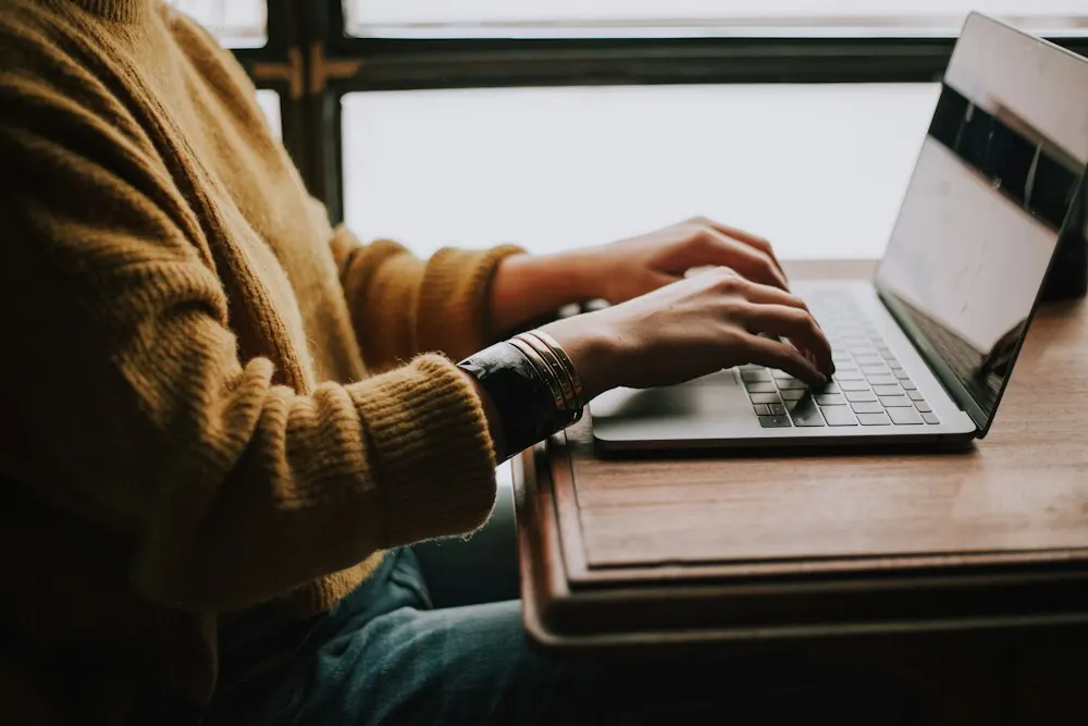 Adult learner studying on a laptop