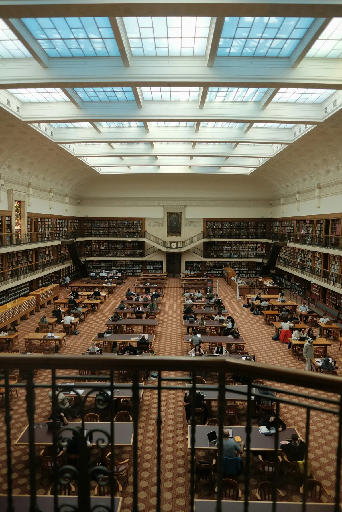 Large library filled with shelves of books