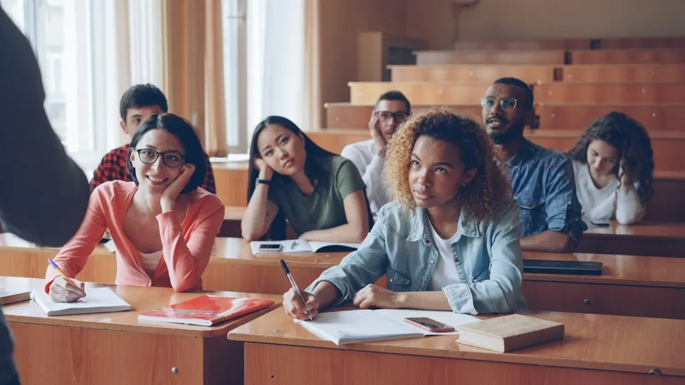 Students listening attentively in a lecture hall