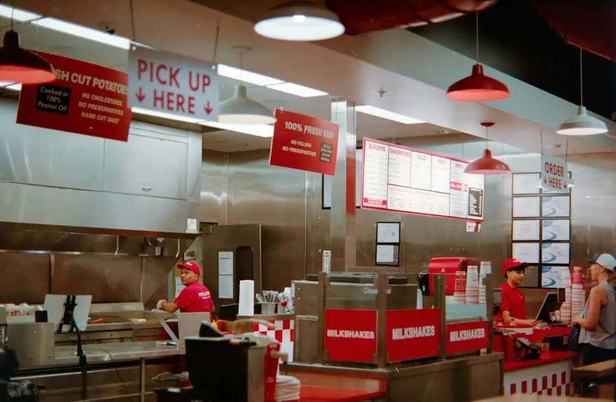 Employees working behind the counter of a quick-service restaurant