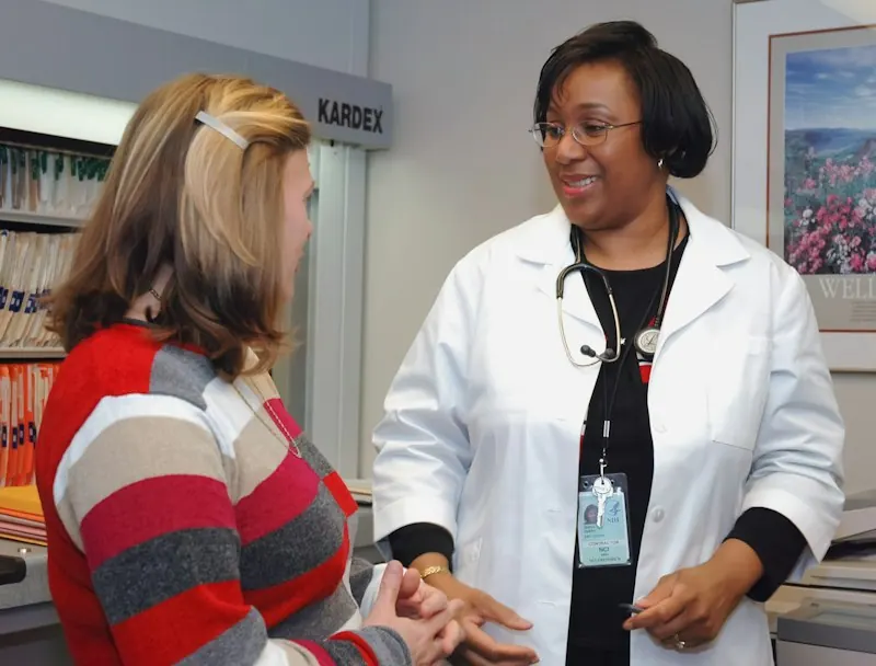 Doctor talking with a patient