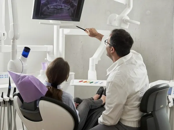 Dentist with a patient