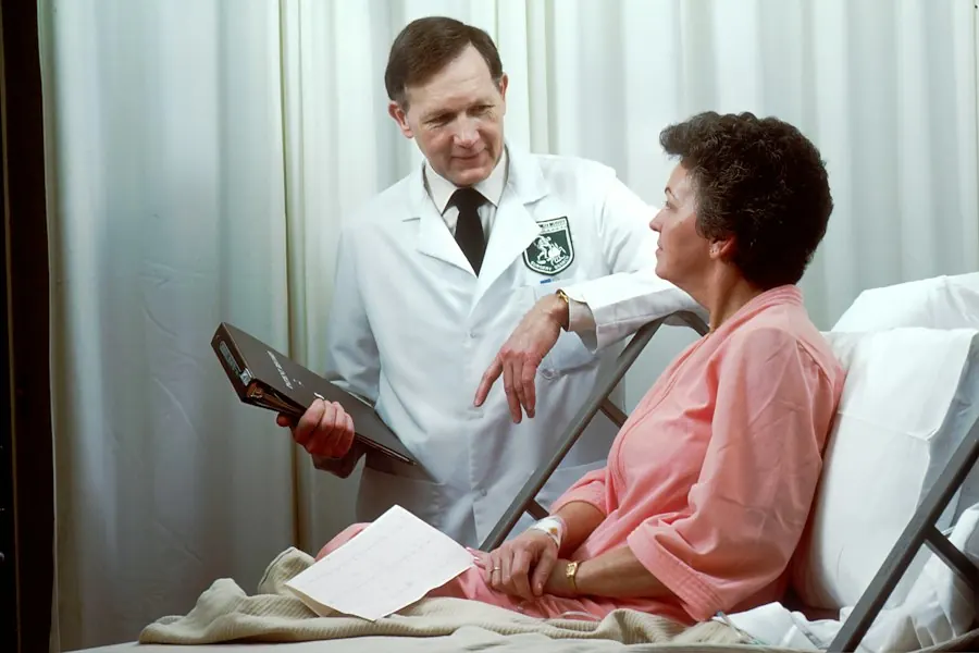 Doctor with a patient and a tablet