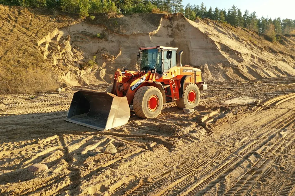 Bulldozer parked on a dirt road