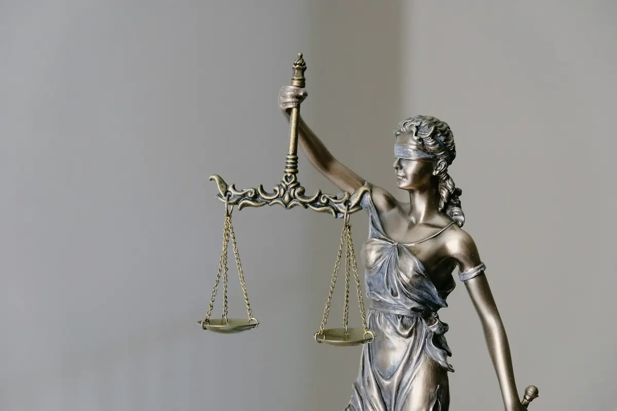 Lady Justice statue holding scales and a sword