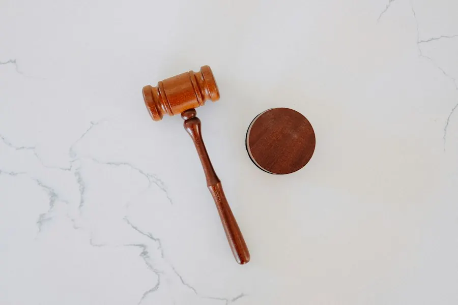Wooden gavel and sound block on marble