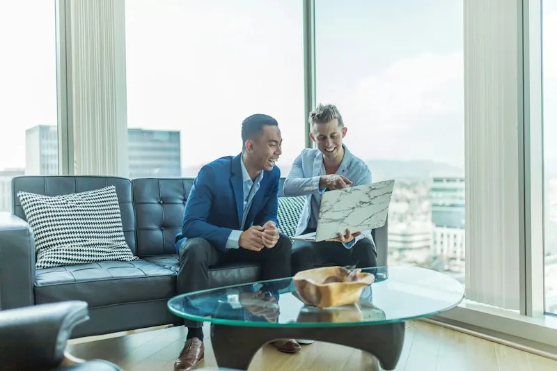 Real estate agent meeting clients