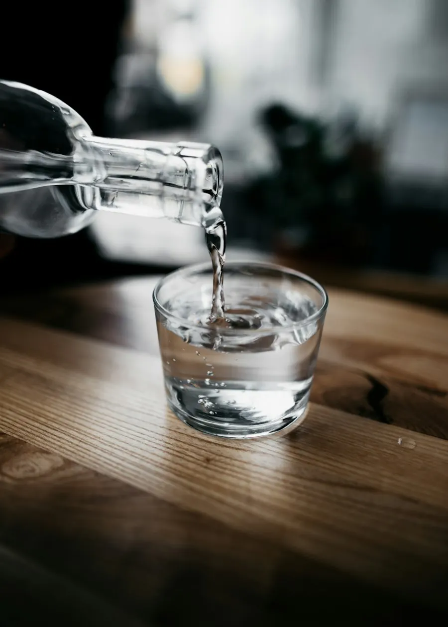 Glass of water being poured