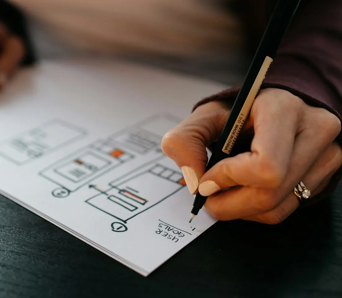 Designer sketching wireframes